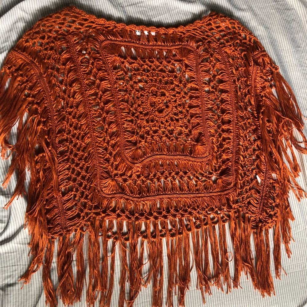 Burnt orange knitted pancho